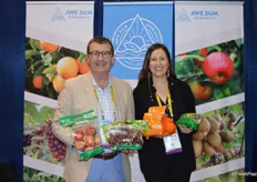 Showing a selection of organic products from Awe Sum Organics are Kirk Crane and Jenn Heinlein.